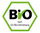 Deutsches sechseckiges Bio-Siegel mit grünem Rand, schwarzem „Bio“-Schriftzug und Text „nach EG-Öko-Verordnung“ auf weißem Hintergrund.